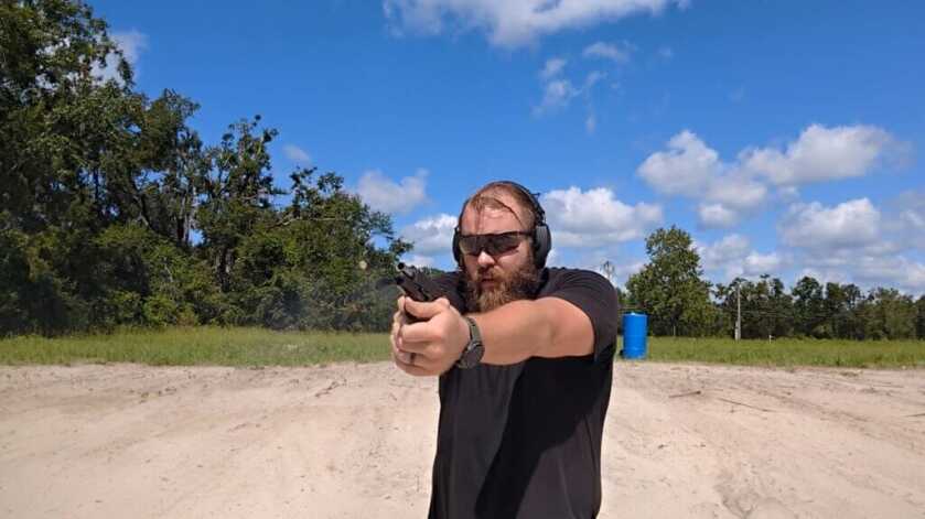 Man on the range with S&W handgun