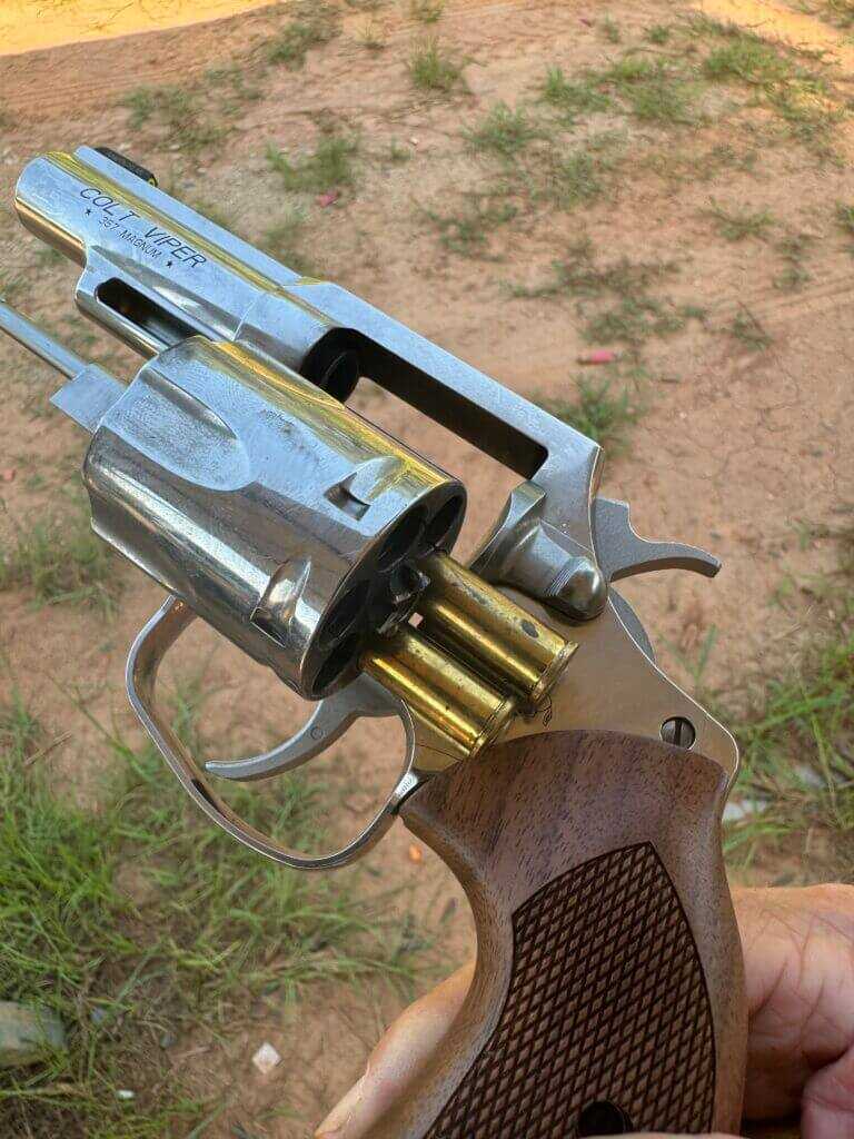 brass ejecting from Colt Viper revolver