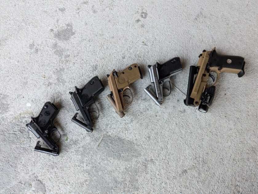 A line of tip-up pistols