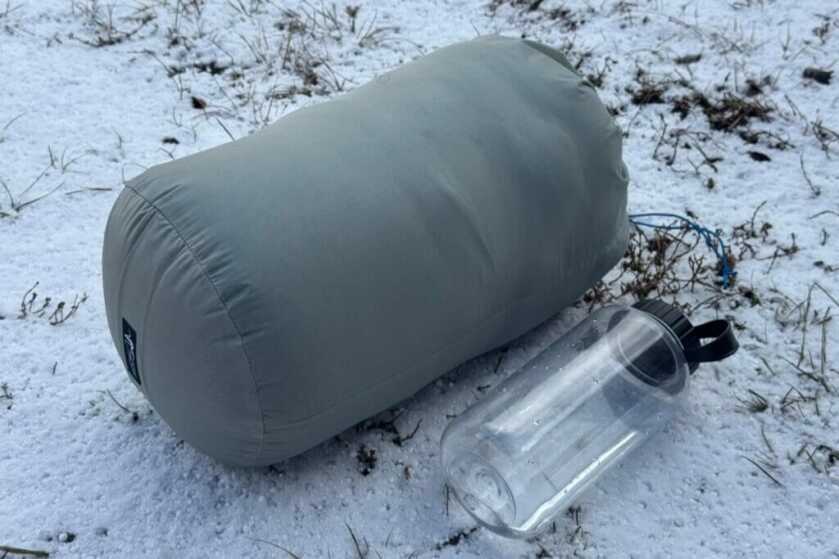 Chilkoot in the provided stuff sack next to a typical Nalgene bottle