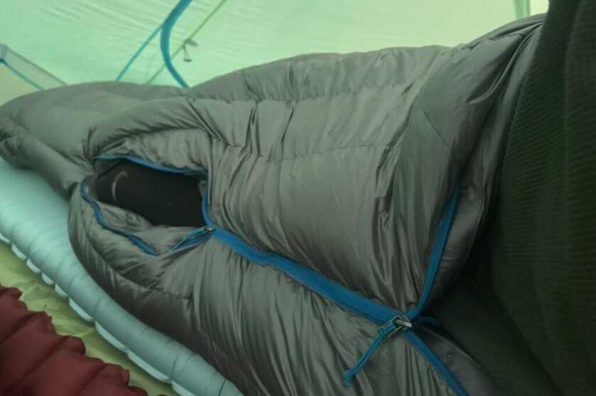 The side zipper is closed from the top, but can also be vented from the bottom on hotter nights