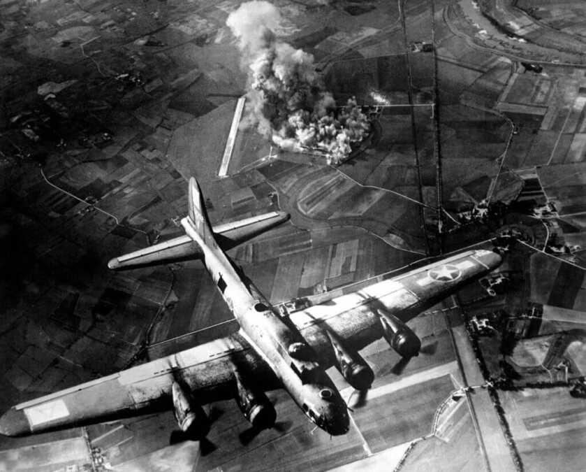 Black and white photo of dogfight from World War 2