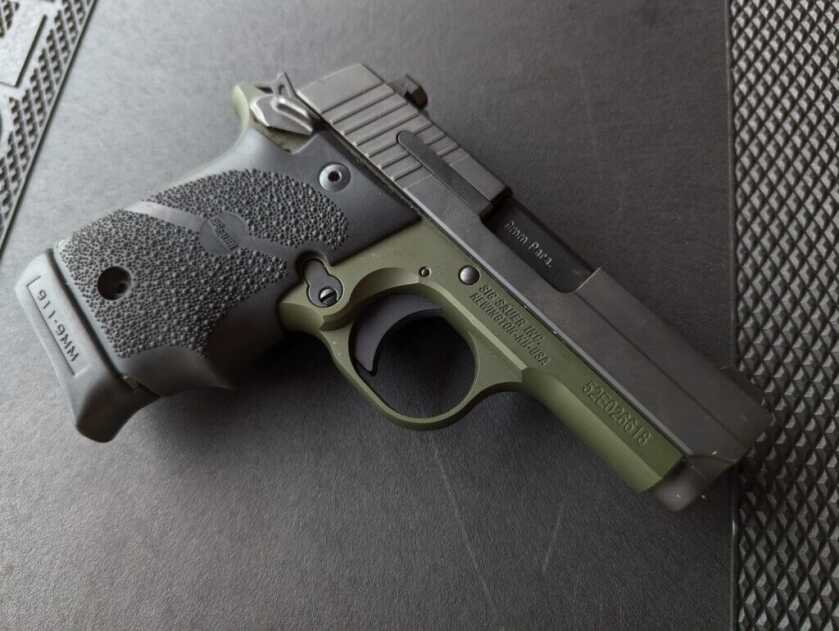 SIG P938 on black background