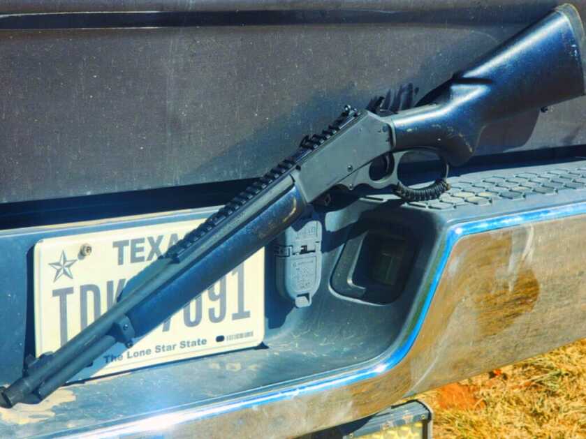 lever-action rifle on truck dark marlin 336
