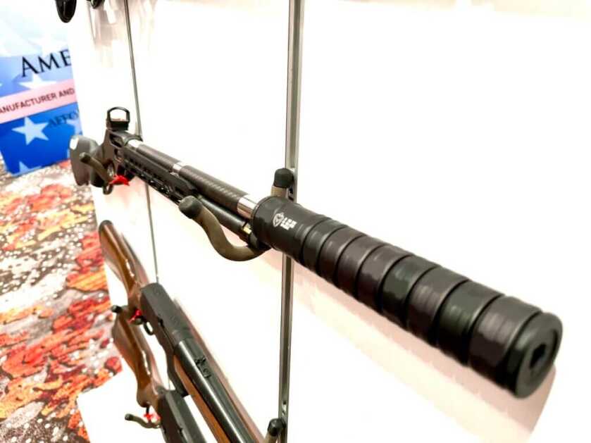 looking at a suppressed rifle from the muzzle end.