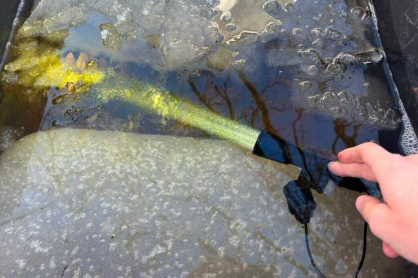 weapon light submersed in cold water