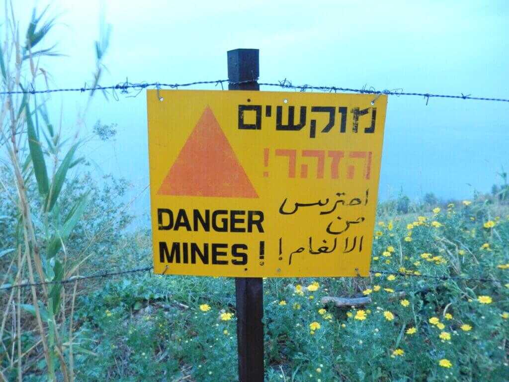 Warning sign in Israel reflecting ever-present security realities