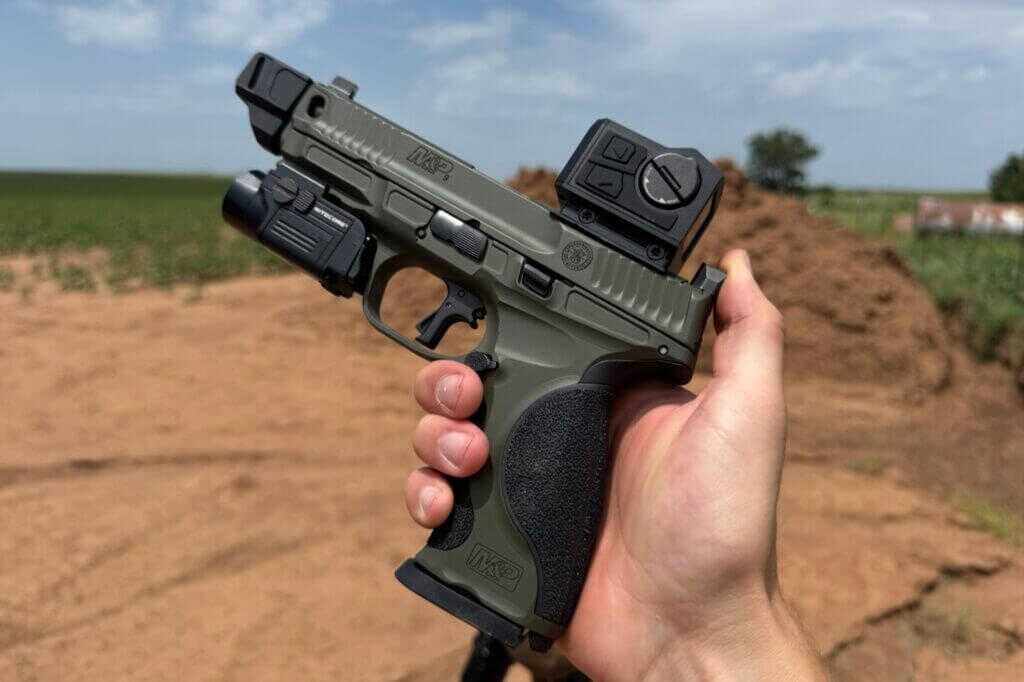 man holding gun. FMP13