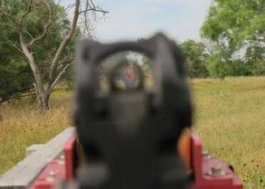 The supplied spacer places the CQS at a near-perfect height to co-witness with the iron sights.