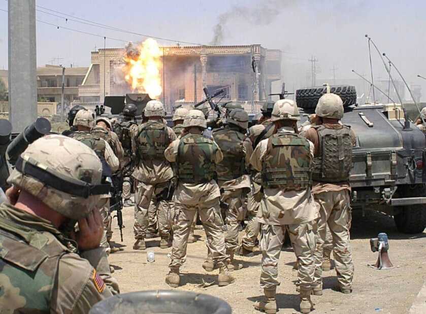 a bunch of military men. hussein